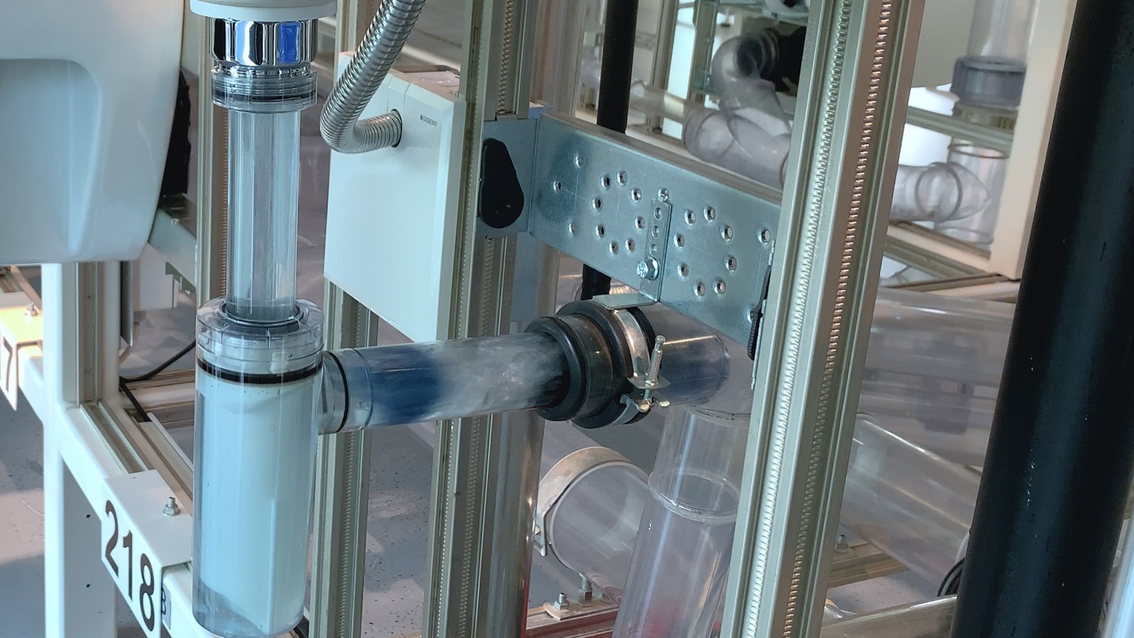 阻塞物松动，然后被冲走